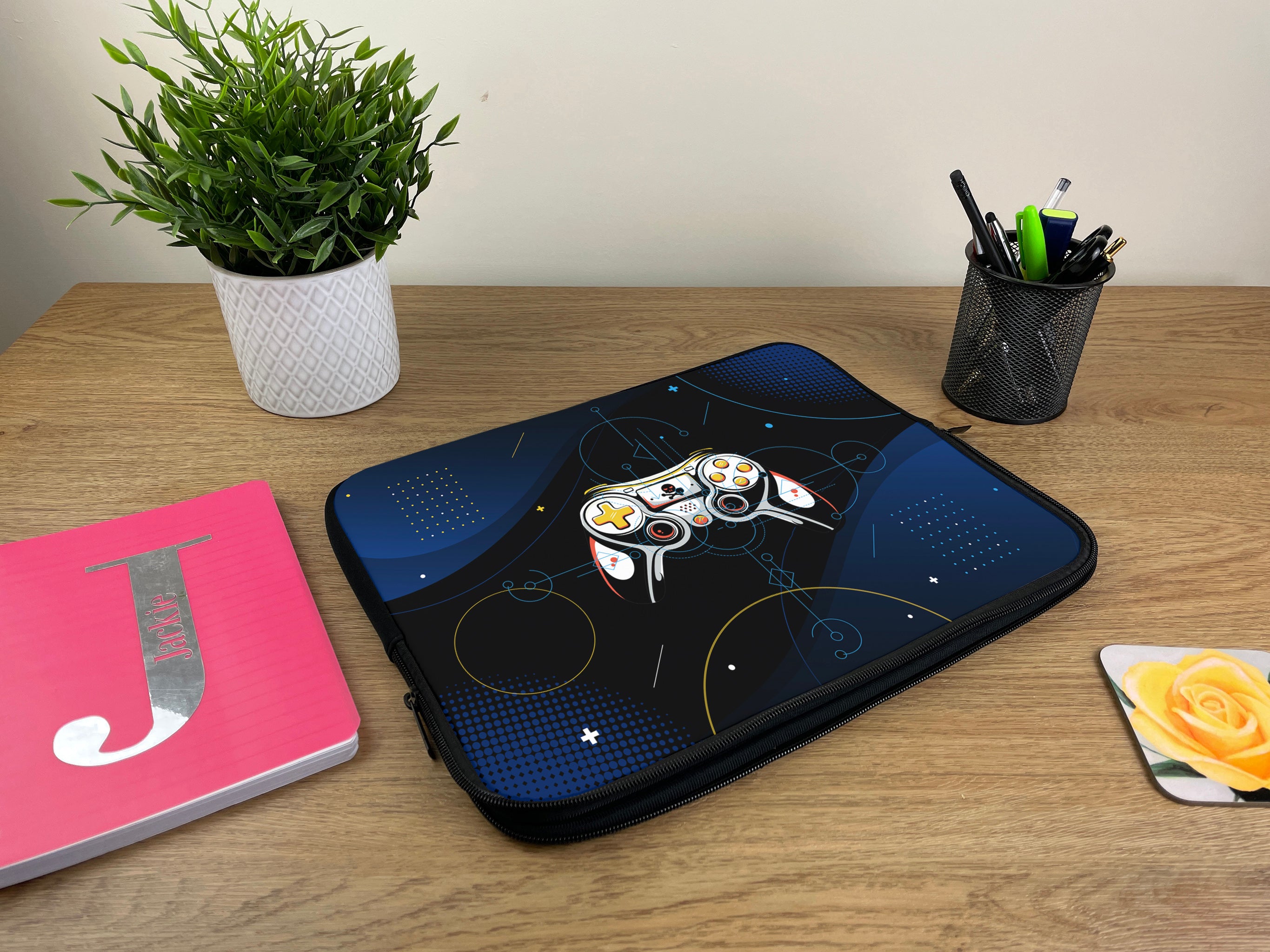 Laptop Sleeve with Galactic Game Controller Design