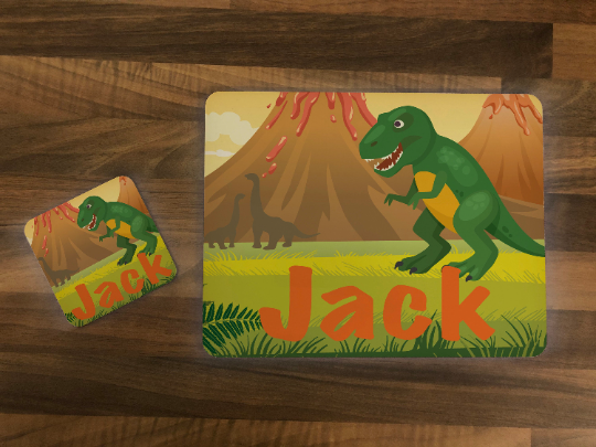 Personalised Kids Hardboard Placemat and Coaster Set Dinosaur Volcano Design